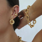 Interlocking Hoop Earrings in Gold