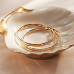 Noa Serane Earrings in Gold Sophistication